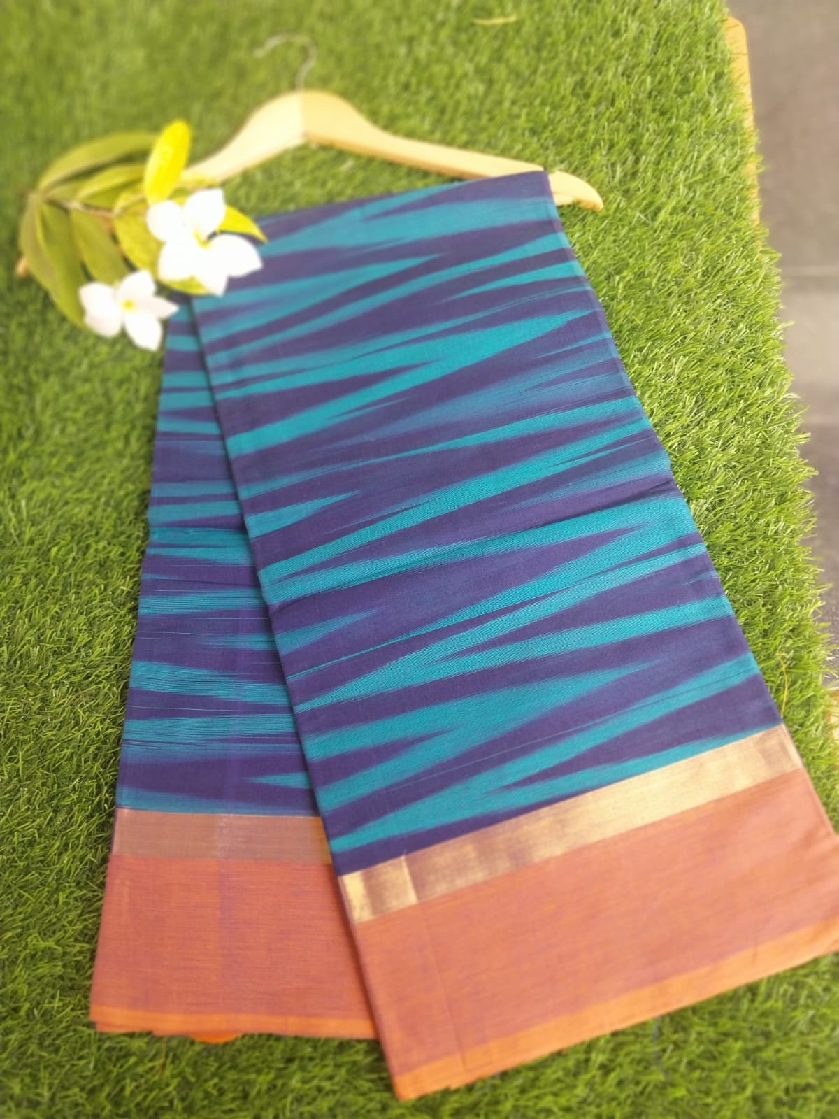 Blue Ikat Saree with Orange Golden Border